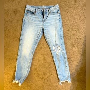 American Eagle High Waisted women’s jeans, tapered leg, light wash, distressed